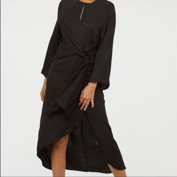 Dresses & Skirts - Black leopard jacquard asymmetrical wrap dress